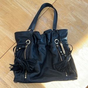 Black Cole Haan magnetic closure slouchy handbag
